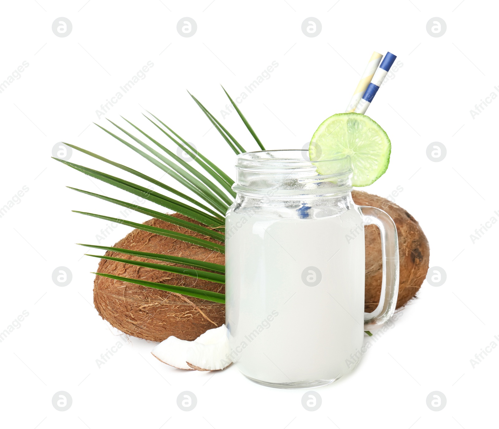 Mason jar with coconut water and nuts on white background Photo of Mason jar with coconut water and nuts on white background