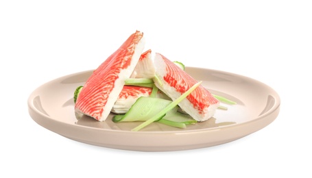 Plate with fresh crab sticks and cucumber isolated on white Photo of Plate with fresh crab sticks and cucumber isolated on white