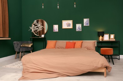 Stylish bedroom with modern furniture. Interior design Photo of Stylish bedroom with modern furniture. Interior design