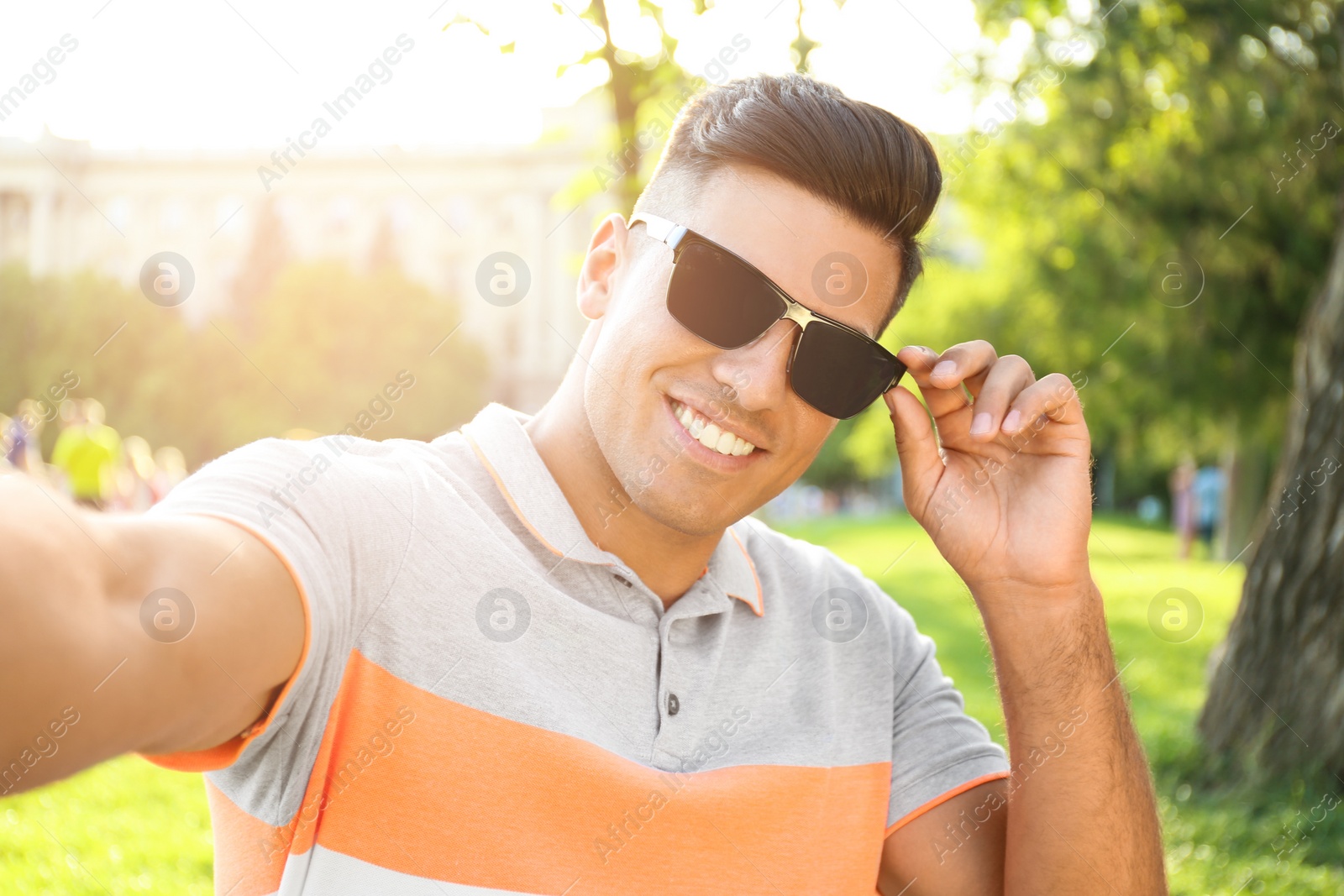 Handsome man taking selfie in stylish sunglasses Photo of Handsome man taking selfie in stylish sunglasses