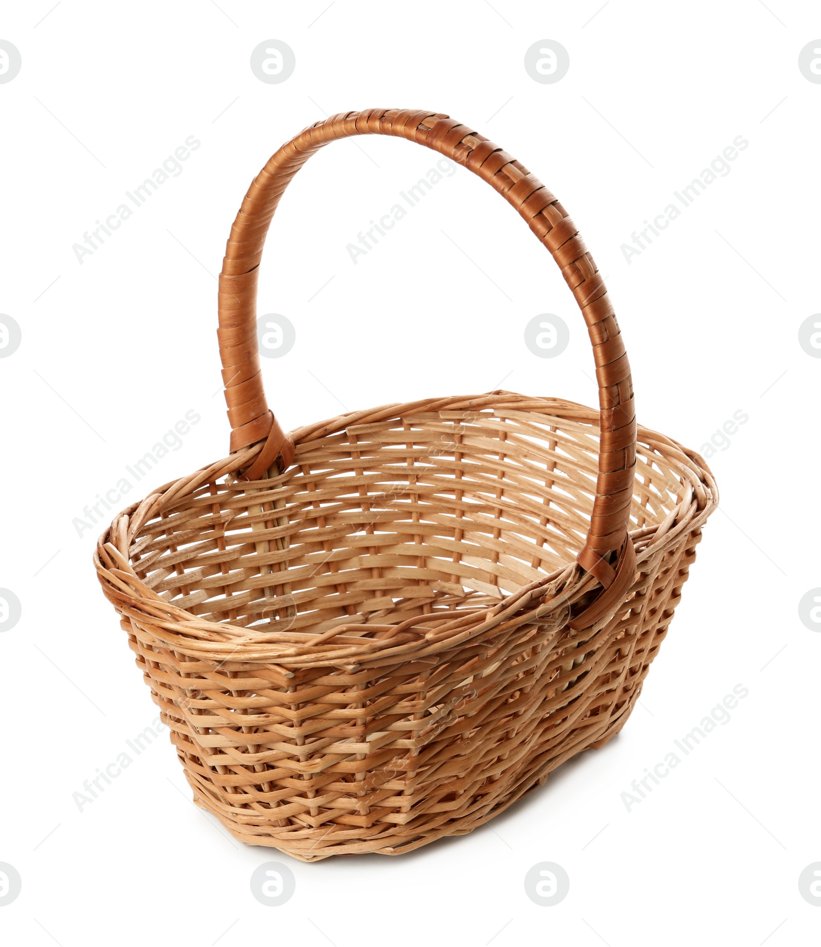 Empty wicker basket isolated on white. Easter item Photo of Empty wicker basket isolated on white. Easter item