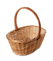 Empty wicker basket isolated on white. Easter item Photo of Empty wicker basket isolated on white. Easter item