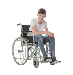 Teen boy in wheelchair on white background Photo of Teen boy in wheelchair on white background