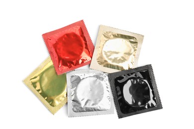 Condom packages on white background, top view. Safe sex Photo of Condom packages on white background, top view. Safe sex