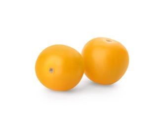 Delicious ripe yellow tomatoes isolated on white Photo of Delicious ripe yellow tomatoes isolated on white
