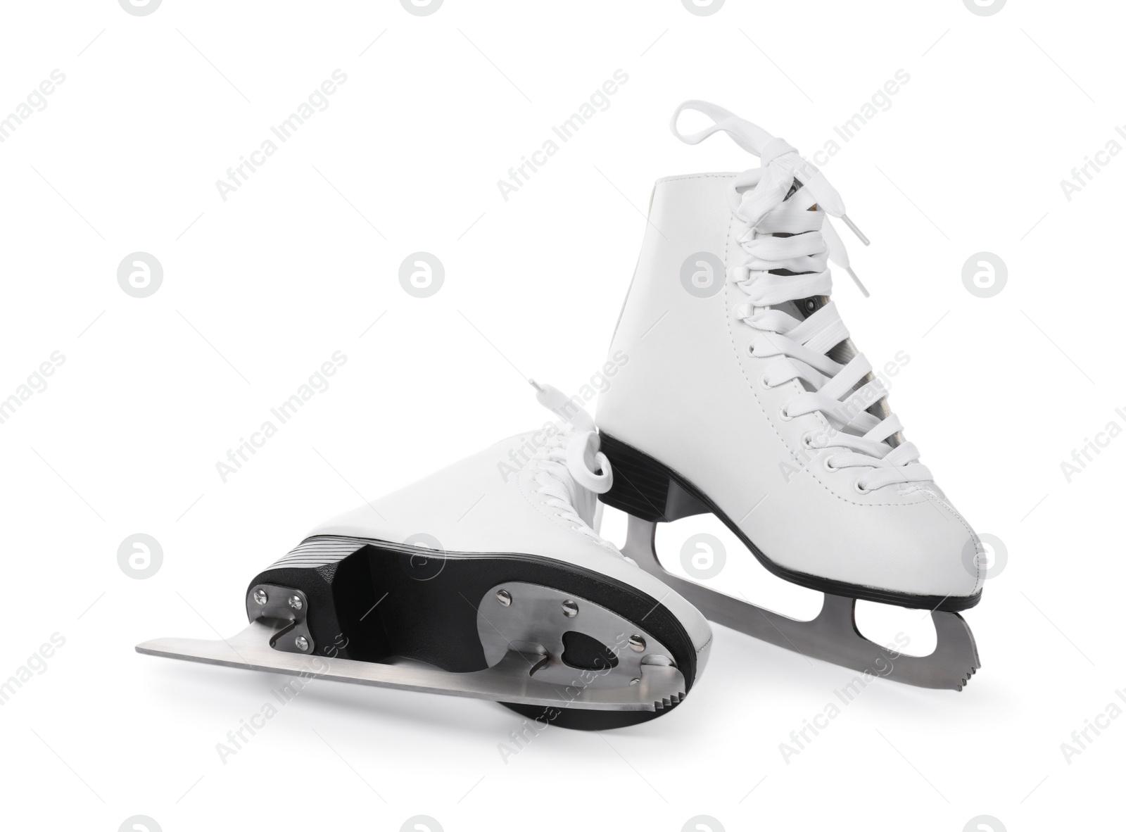 Pair of figure ice skates isolated on white Photo of Pair of figure ice skates isolated on white