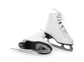 Pair of figure ice skates isolated on white Photo of Pair of figure ice skates isolated on white