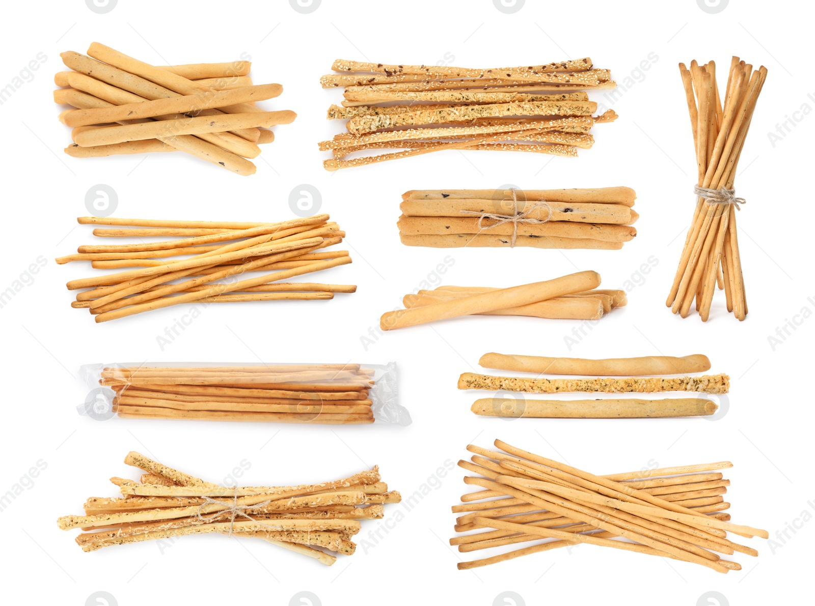 Set with delicious crispy grissini sticks on white background Image of Set with delicious crispy grissini sticks on white background