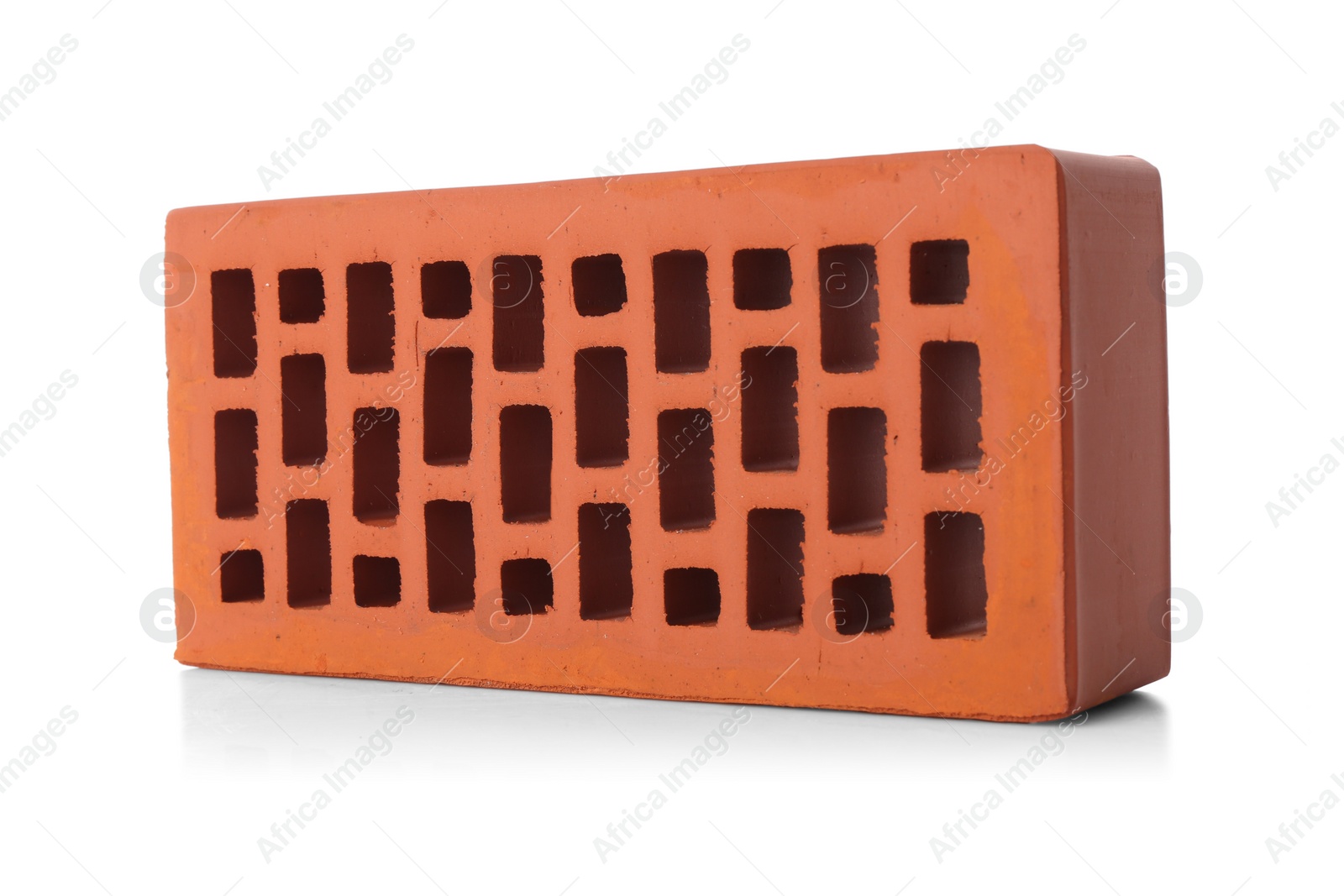 One red brick isolated on white. Building material Photo of One red brick isolated on white. Building material