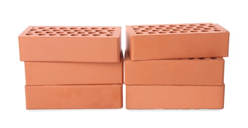 Many red bricks on white background. Building material Photo of Many red bricks on white background. Building material