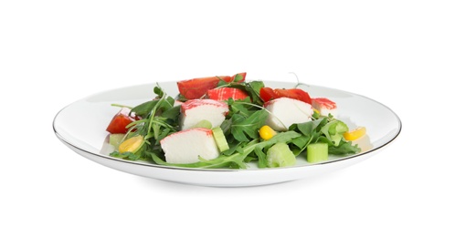 Tasty crab stick salad isolated on white Photo of Tasty crab stick salad isolated on white