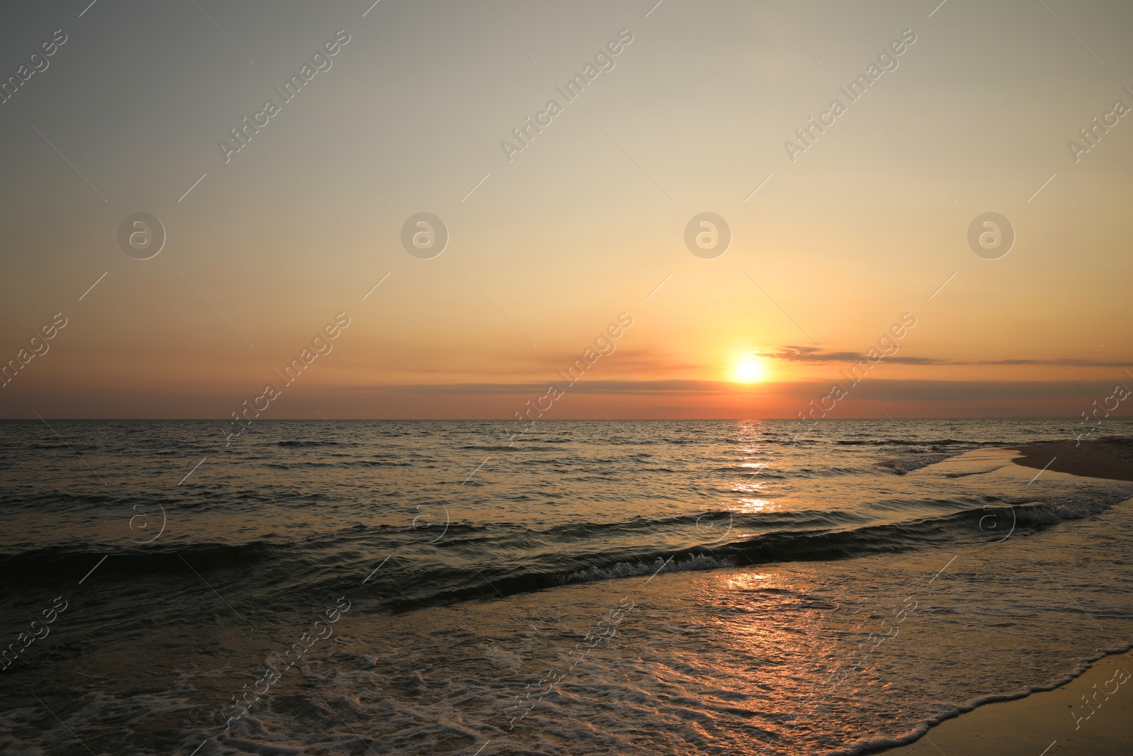 Beautiful view of sky over sea at sunset Photo of Beautiful view of sky over sea at sunset
