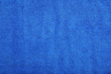 Blue microfiber cloth as background, top view Photo of Blue microfiber cloth as background, top view