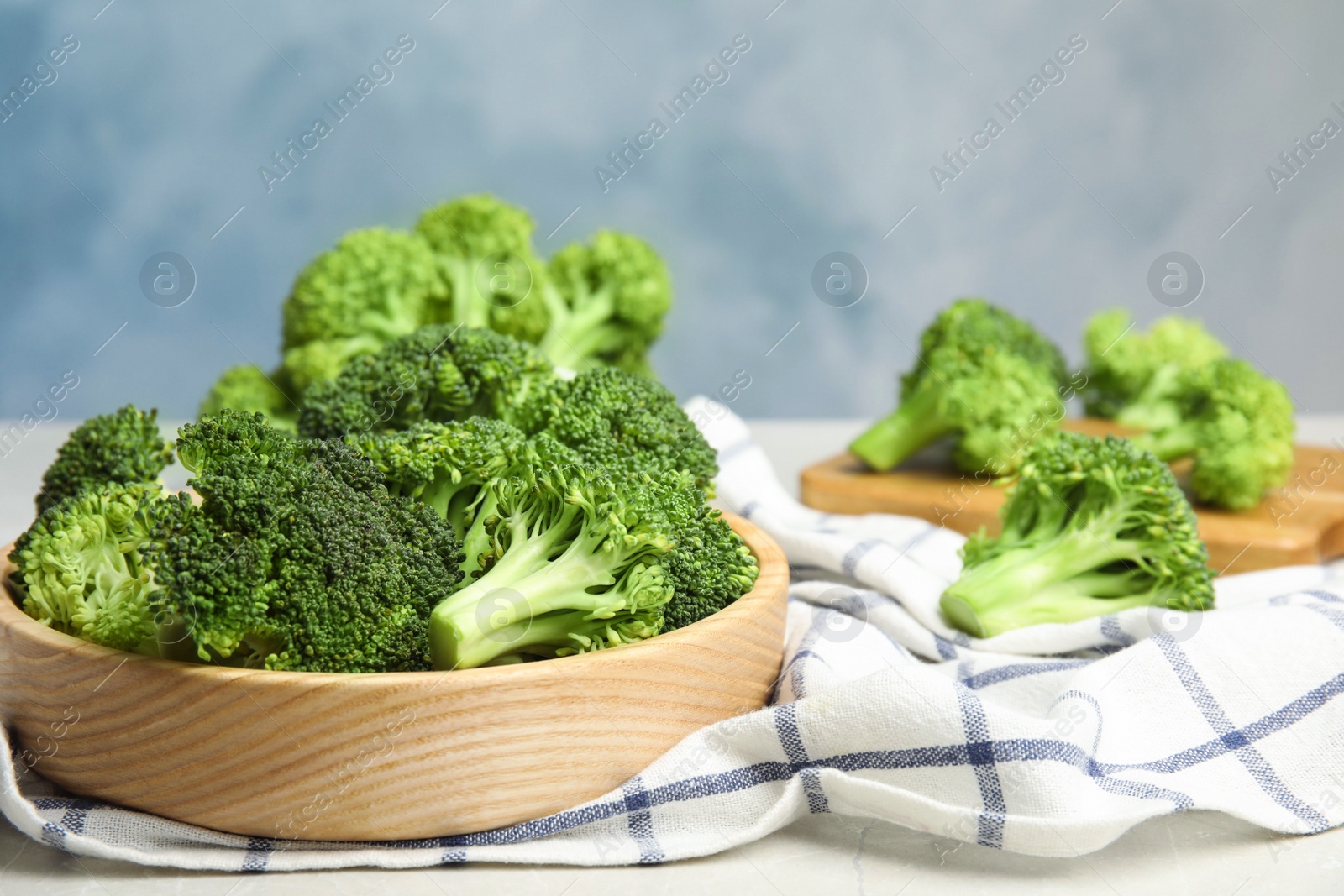 Fresh green broccoli on table. Space for text Photo of Fresh green broccoli on table. Space for text