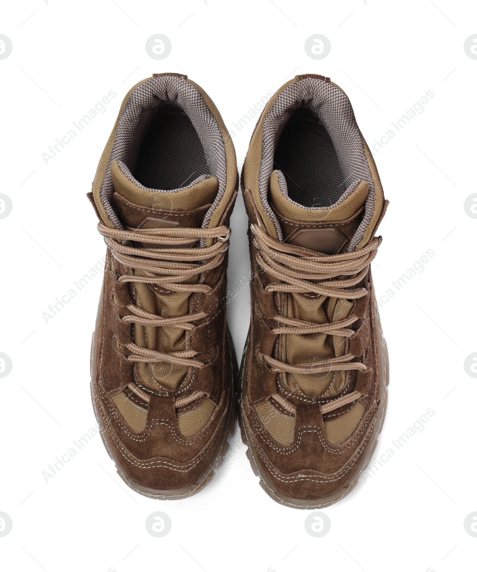 Pair of comfortable hiking boots on white background, top view. Camping tourism Photo of Pair of comfortable hiking boots on white background, top view. Camping tourism