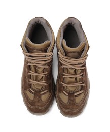 Pair of comfortable hiking boots on white background, top view. Camping tourism Photo of Pair of comfortable hiking boots on white background, top view. Camping tourism