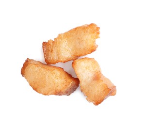 Tasty fried cracklings on white background, top view. Cooked pork lard Photo of Tasty fried cracklings on white background, top view. Cooked pork lard