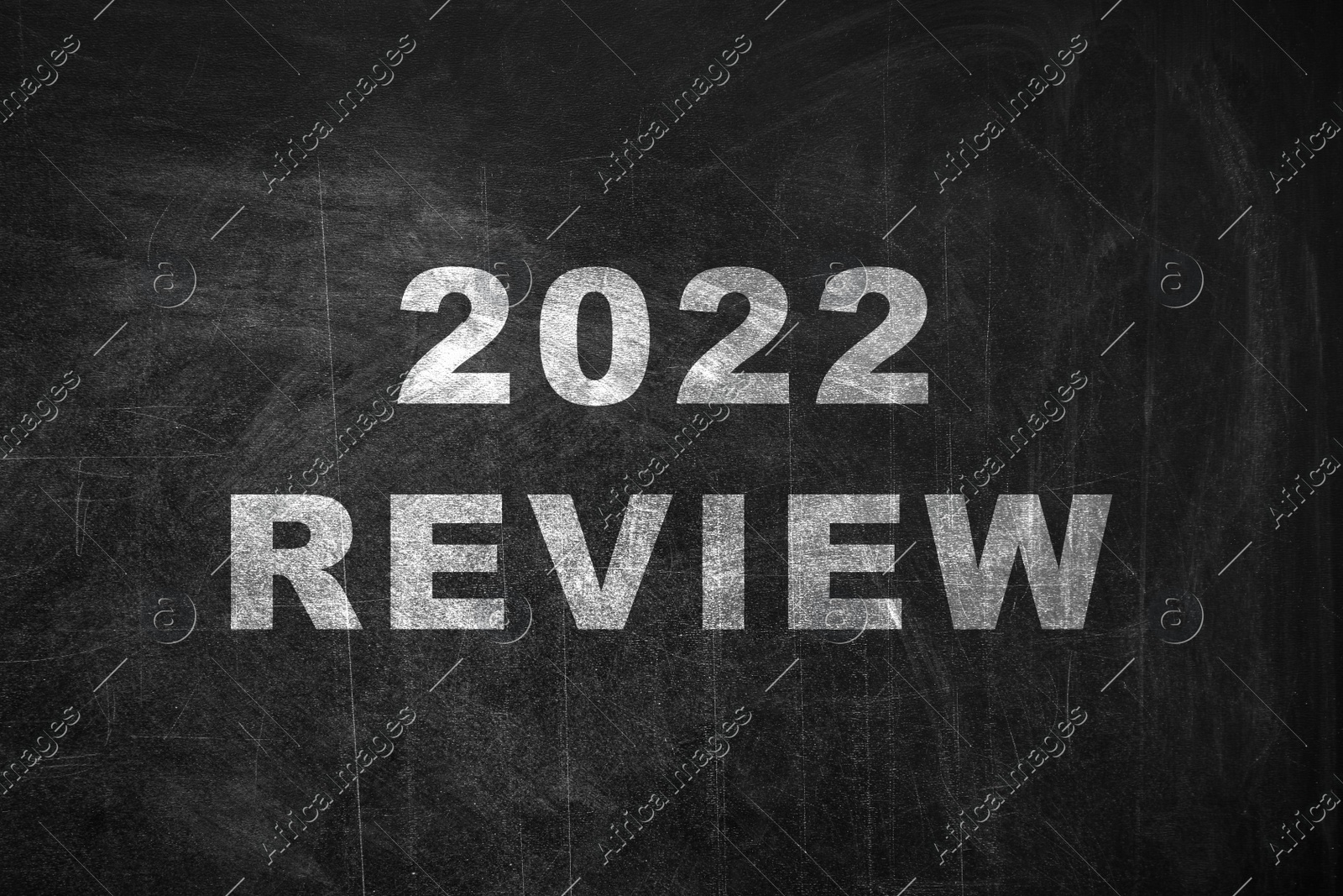 Text 2022 Review written on black chalkboard Illustration of Text 2022 Review written on black chalkboard