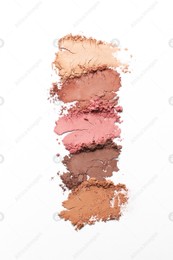 Crushed eye shadows on white background, top view. Professional makeup product Photo of Crushed eye shadows on white background, top view. Professional makeup product