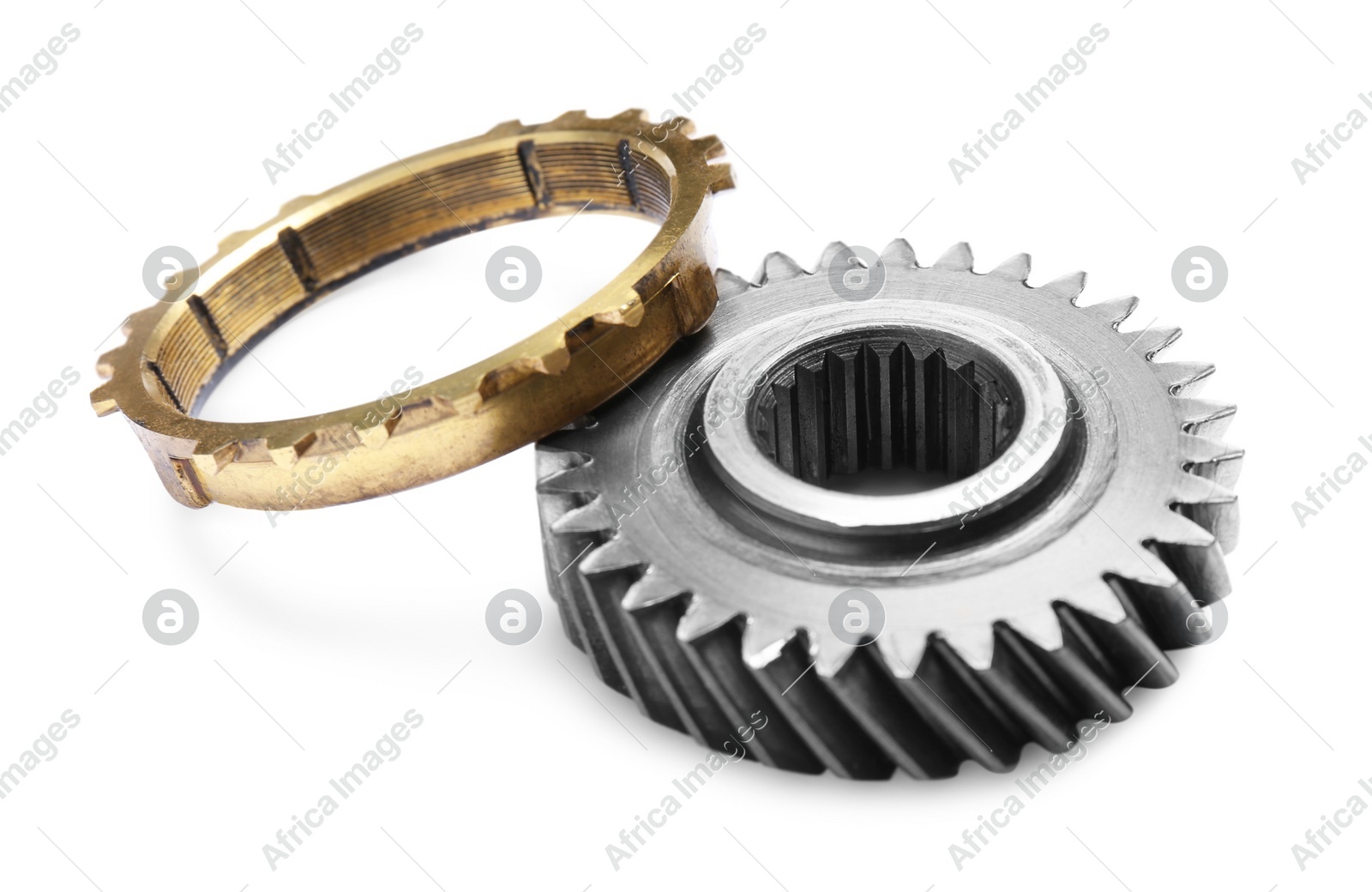 Different stainless steel gears on white background Photo of Different stainless steel gears on white background