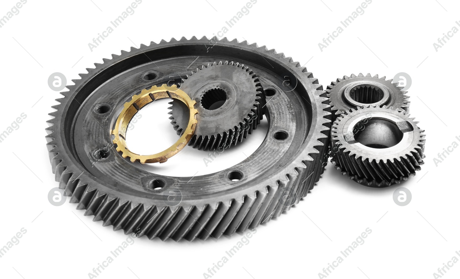 Different stainless steel gears on white background Photo of Different stainless steel gears on white background