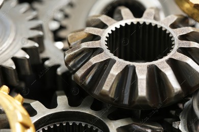 Many different stainless steel gears as background, closeup Photo of Many different stainless steel gears as background, closeup