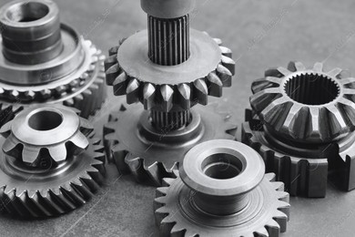 Different stainless steel gears on background, closeup Photo of Different stainless steel gears on background, closeup