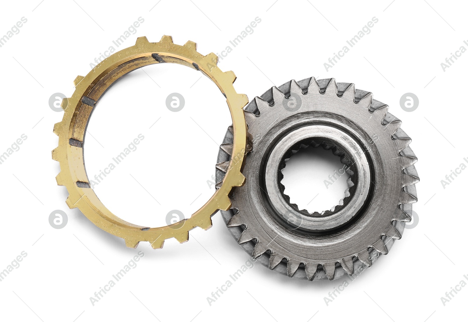 Different stainless steel gears on white background, top view Photo of Different stainless steel gears on white background, top view