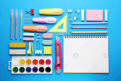 Different school stationery on light blue background, flat lay. Back to school Photo of Different school stationery on light blue background, flat lay. Back to school