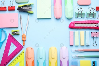 Frame of different school stationery on light blue background, flat lay. Back to school Photo of Frame of different school stationery on light blue background, flat lay. Back to school