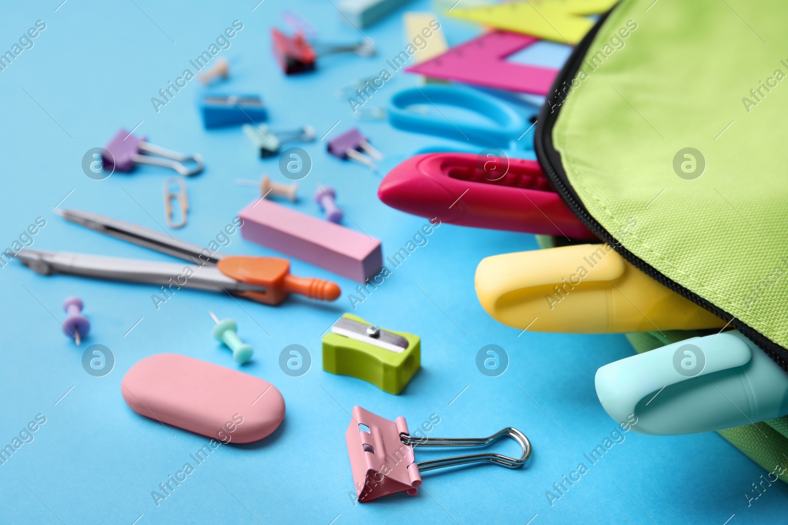 Back to school. Many different school stationery on light blue background Photo of Back to school. Many different school stationery on light blue background