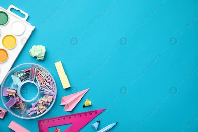 Different school stationery items on light blue background, flat lay with space for text. Back to school Photo of Different school stationery items on light blue background, flat lay with space for text. Back to school