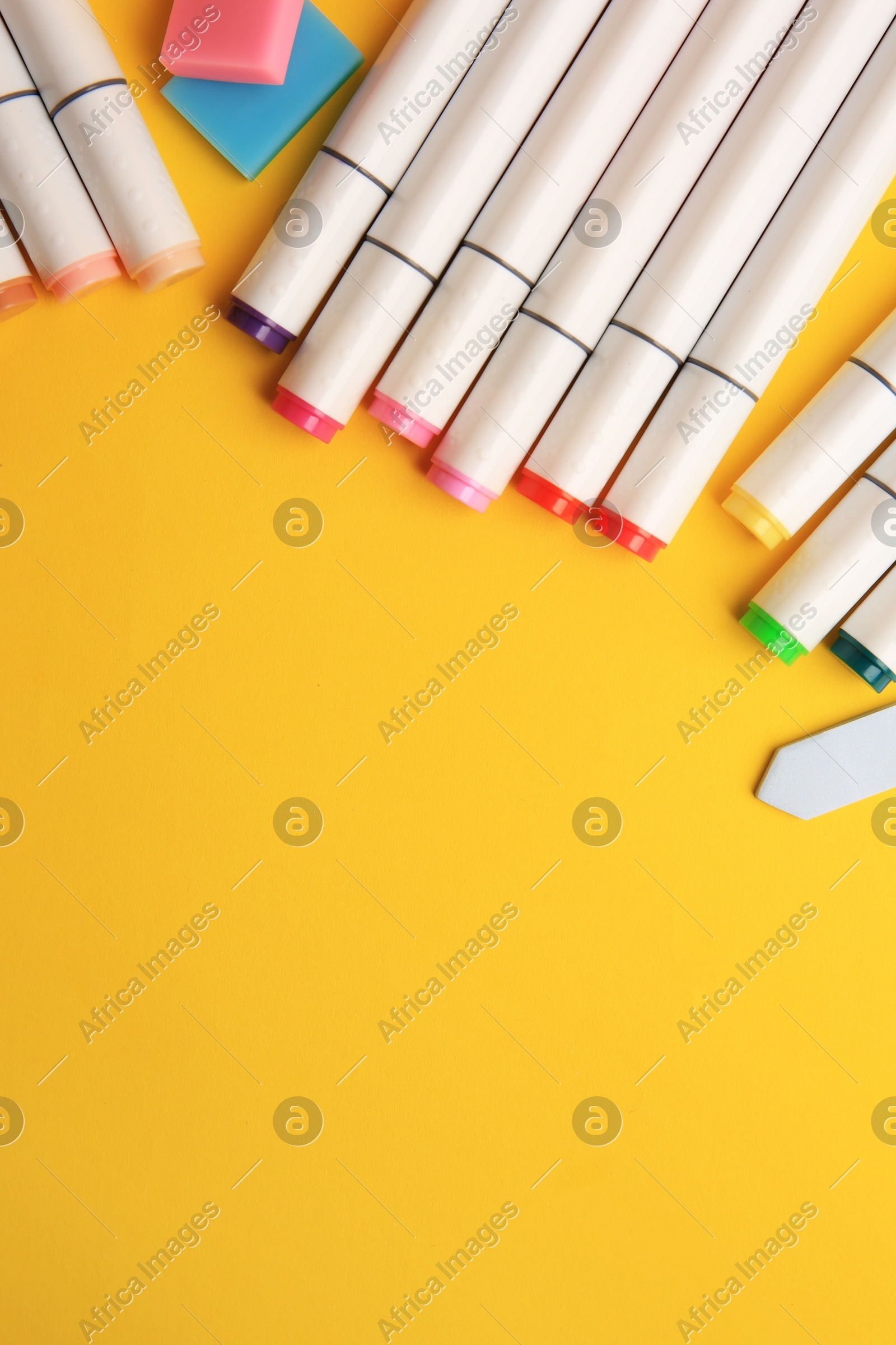 Different school stationery on yellow background, flat lay with space for text. Back to school Photo of Different school stationery on yellow background, flat lay with space for text. Back to school