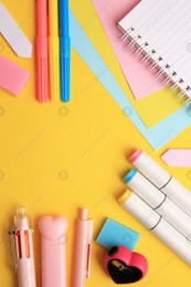 Different school stationery on yellow background, flat lay with space for text. Back to school Photo of Different school stationery on yellow background, flat lay with space for text. Back to school