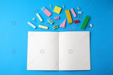 Flat lay composition with school stationery on light blue background. Back to school Photo of Flat lay composition with school stationery on light blue background. Back to school