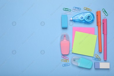 Flat lay composition with different school stationery on light blue background, space for text. Back to school Photo of Flat lay composition with different school stationery on light blue background, space for text. Back to school