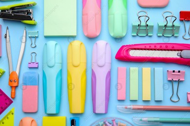 Many different school stationery on light blue background, flat lay. Back to school Photo of Many different school stationery on light blue background, flat lay. Back to school