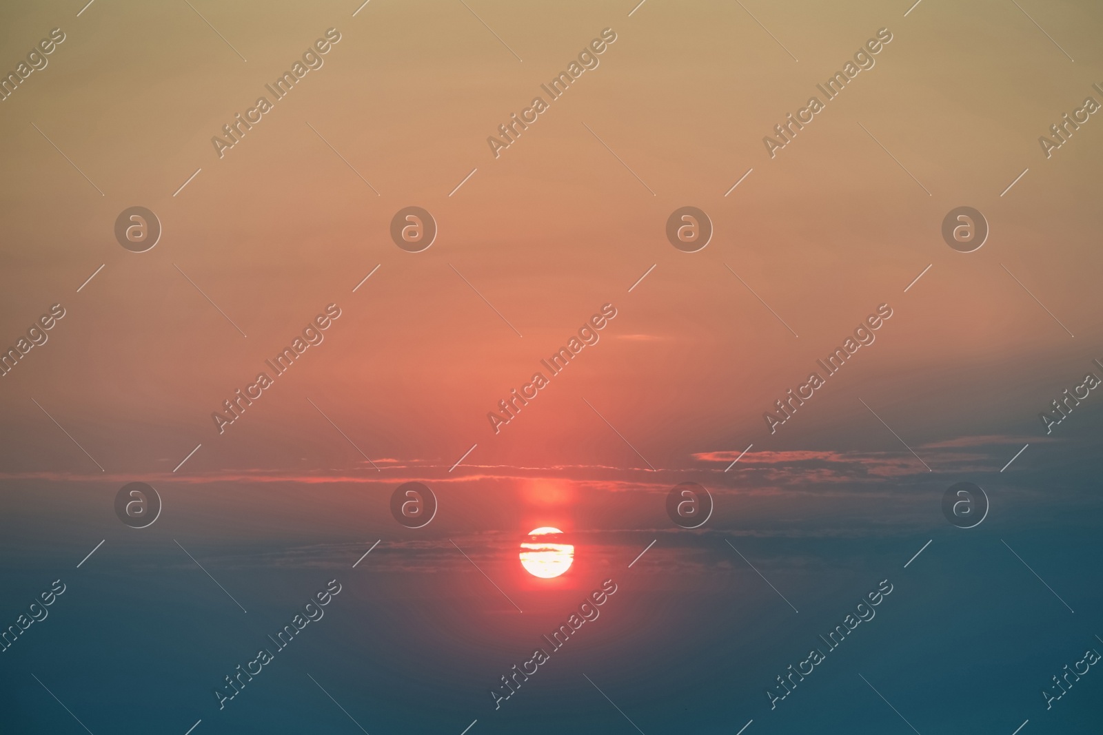 Picturesque view of sky with sun at sunset Photo of Picturesque view of sky with sun at sunset