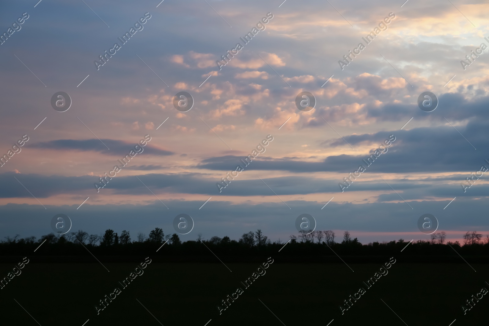 Picturesque view of beautiful countryside at sunset Photo of Picturesque view of beautiful countryside at sunset