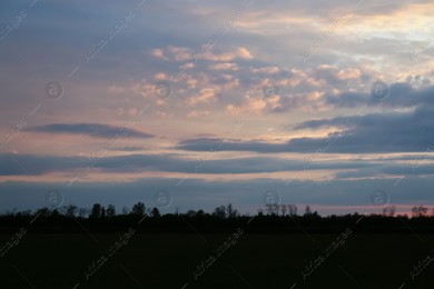 Picturesque view of beautiful countryside at sunset Photo of Picturesque view of beautiful countryside at sunset