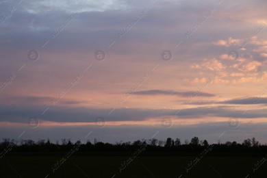 Picturesque view of beautiful countryside at sunset Photo of Picturesque view of beautiful countryside at sunset
