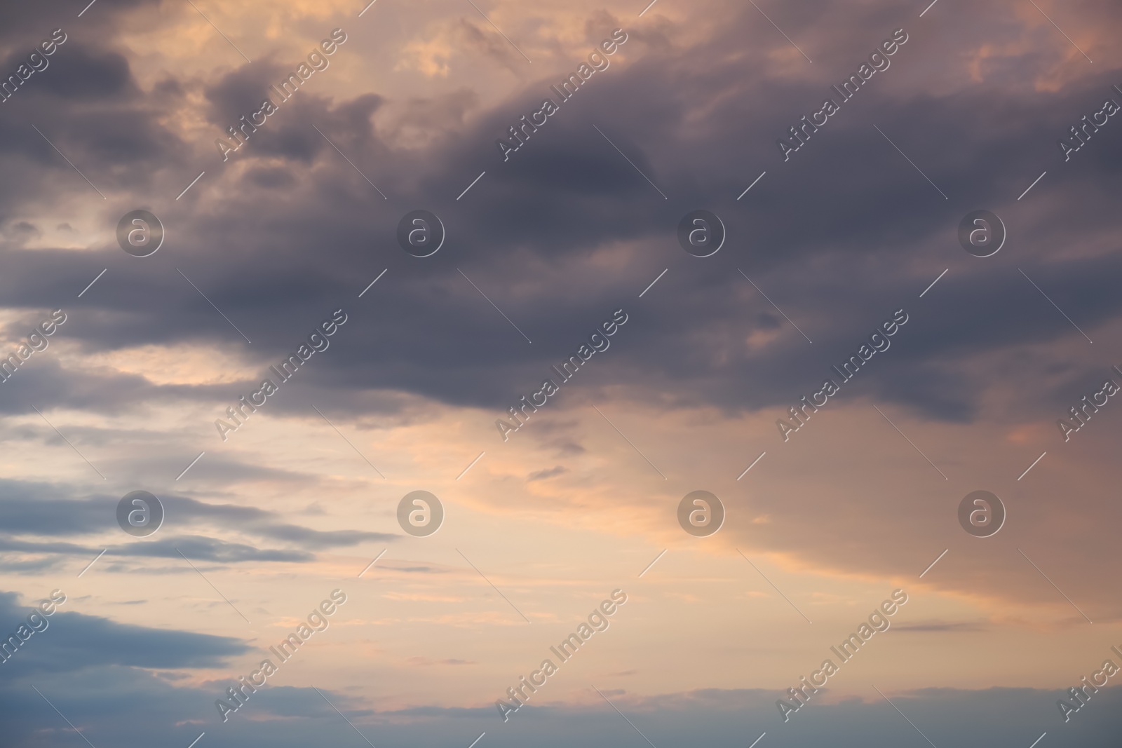 Picturesque view of sunset sky with beautiful clouds Photo of Picturesque view of sunset sky with beautiful clouds