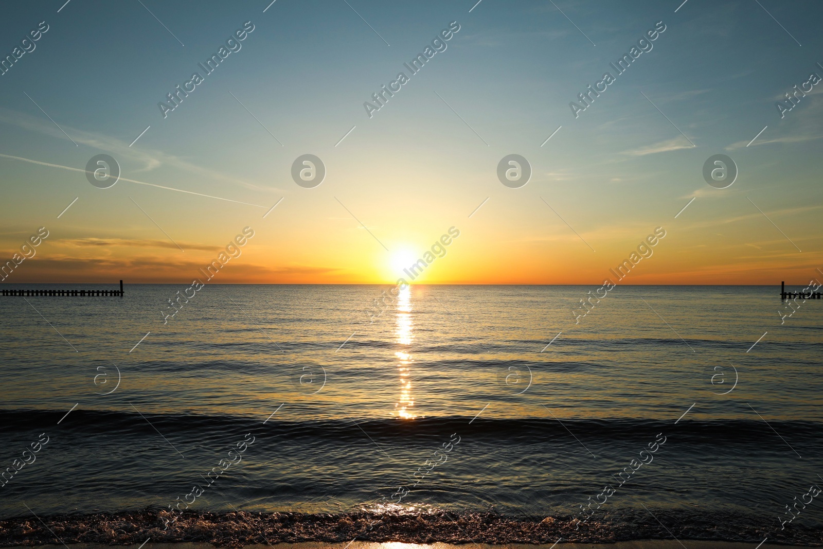 Picturesque view of beautiful sea at sunset Photo of Picturesque view of beautiful sea at sunset