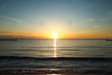 Picturesque view of beautiful sea at sunset Photo of Picturesque view of beautiful sea at sunset