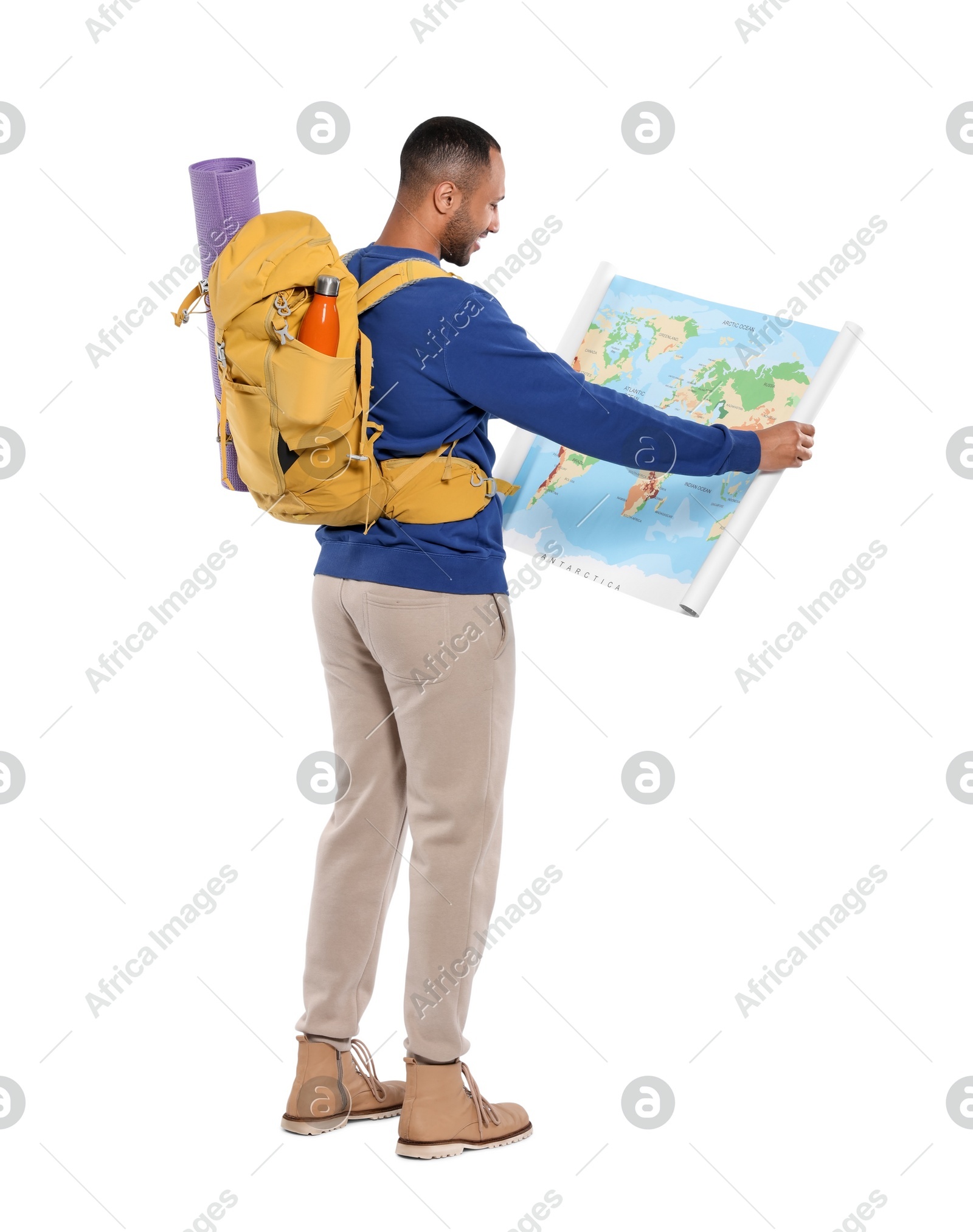 Tourist with backpack and map on white background Photo of Tourist with backpack and map on white background