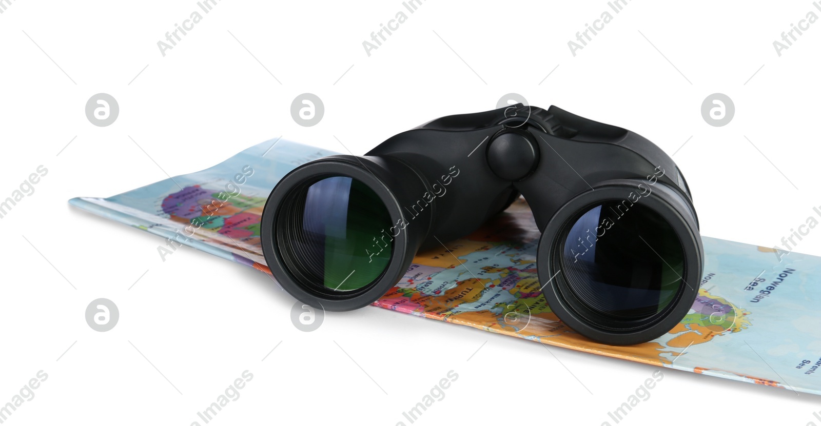 Modern binoculars and map on white background Photo of Modern binoculars and map on white background