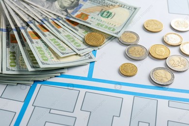 Money on cadastral map of territory with buildings Photo of Money on cadastral map of territory with buildings