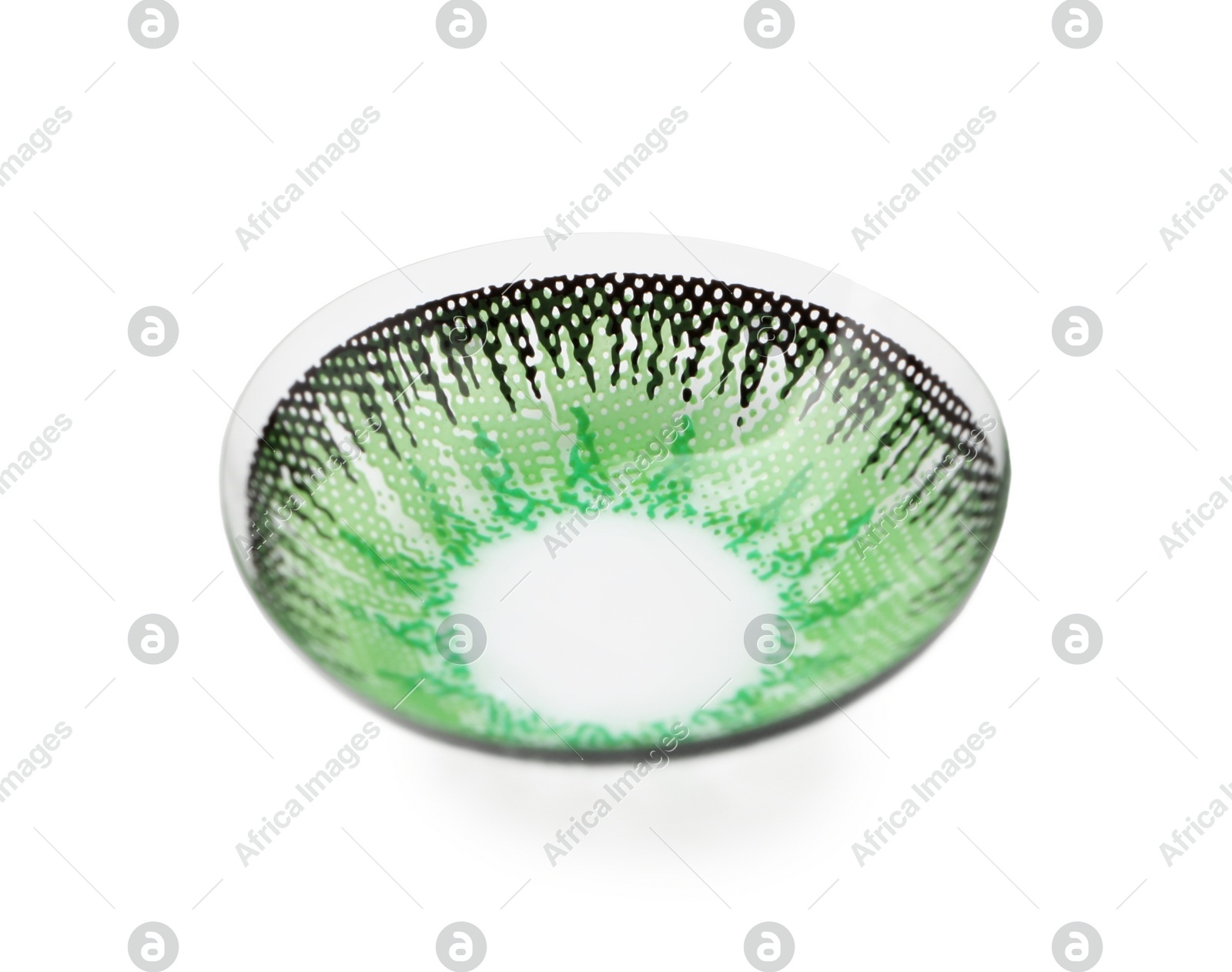 One green contact lens isolated on white Photo of One green contact lens isolated on white