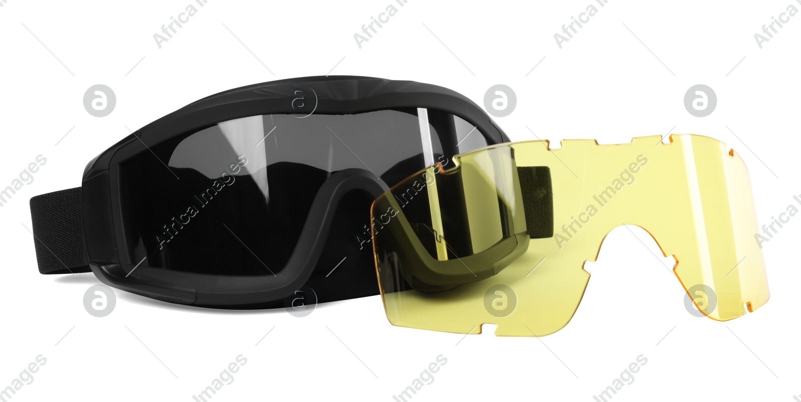 Tactical glasses and yellow lens on white background. Military training equipment Photo of Tactical glasses and yellow lens on white background. Military training equipment