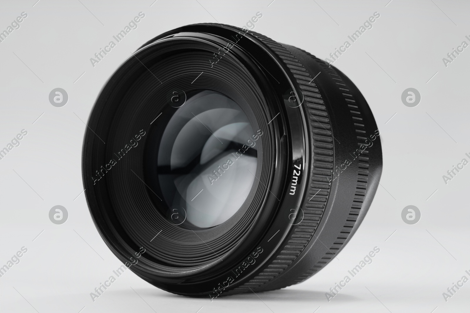 Camera lens on white background. Photographer's equipment Photo of Camera lens on white background. Photographer's equipment